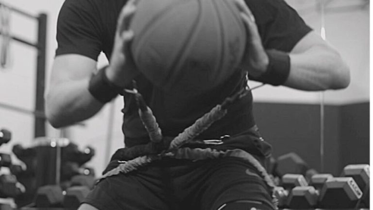An athlete training with resistance bands